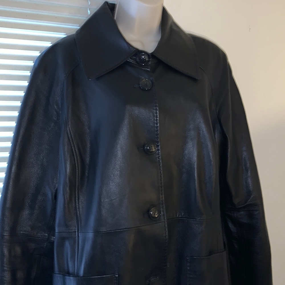 This is a Katherine Kelly lambskin jacket. It is brand new with tags. Dillards